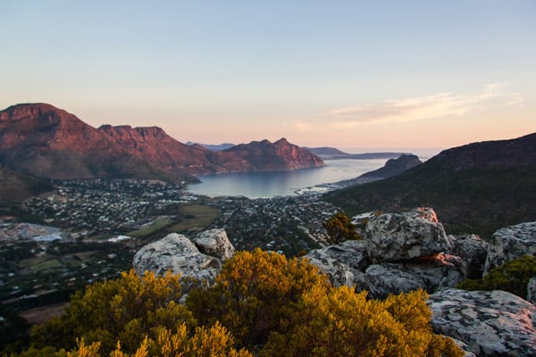 Sunset mountaintop view of Cape town South Africa's mountains, ocean and skies.