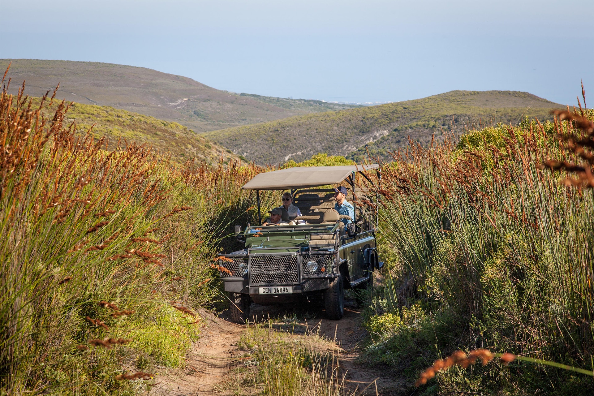 A 4x4 safari vehicle traverses the reserve at Grootbos Forest Lodge