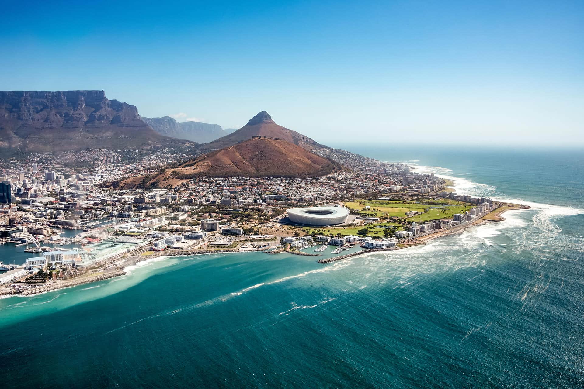 Ariel view of South Africa's beautiful Cape town. Mountains, landmarks, buildings, coastal and ocean view.