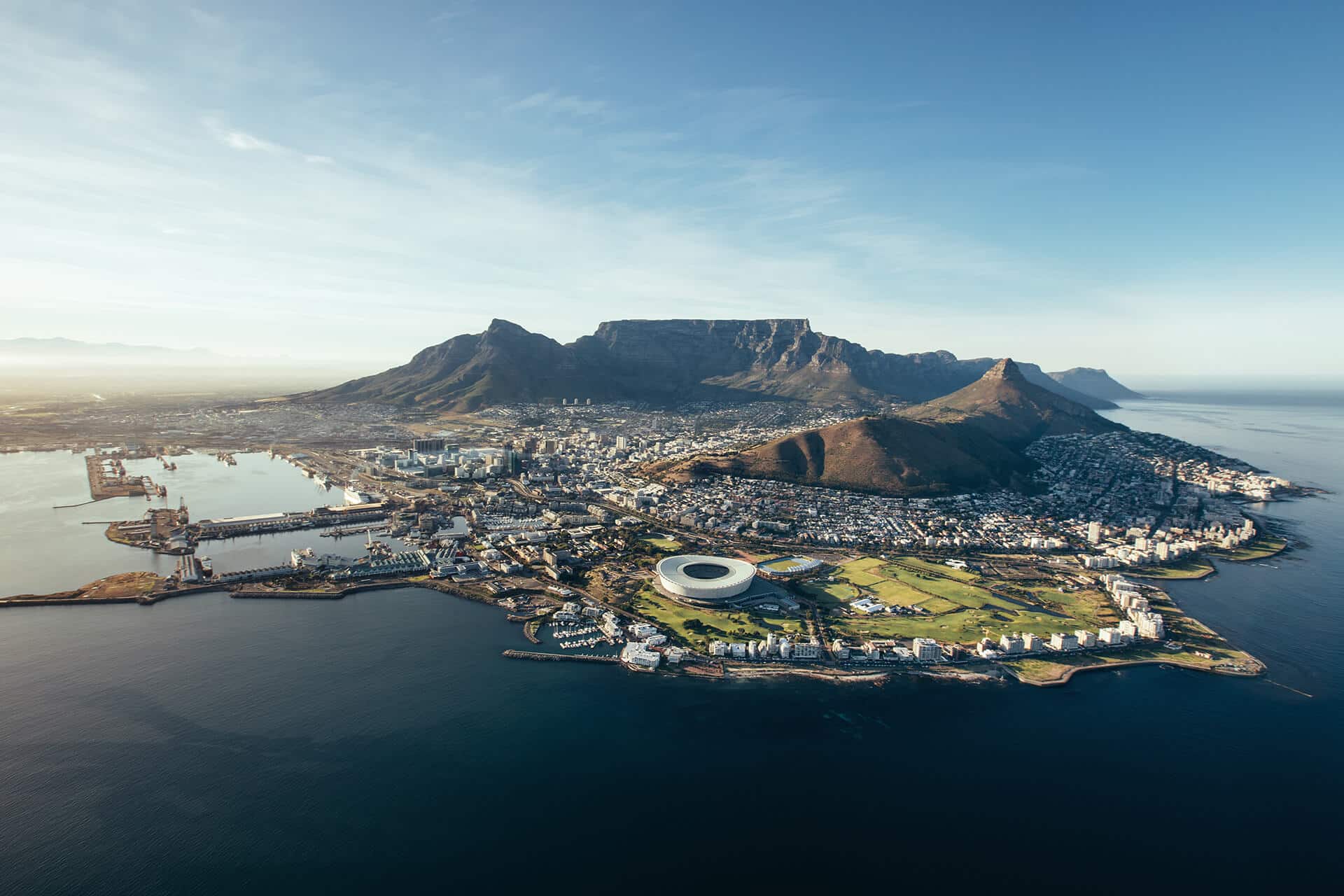 Stunning Ariel view of the beauty of Cape Town buildings, landmarks, mountains, ocean and green spaces. In South Africa.