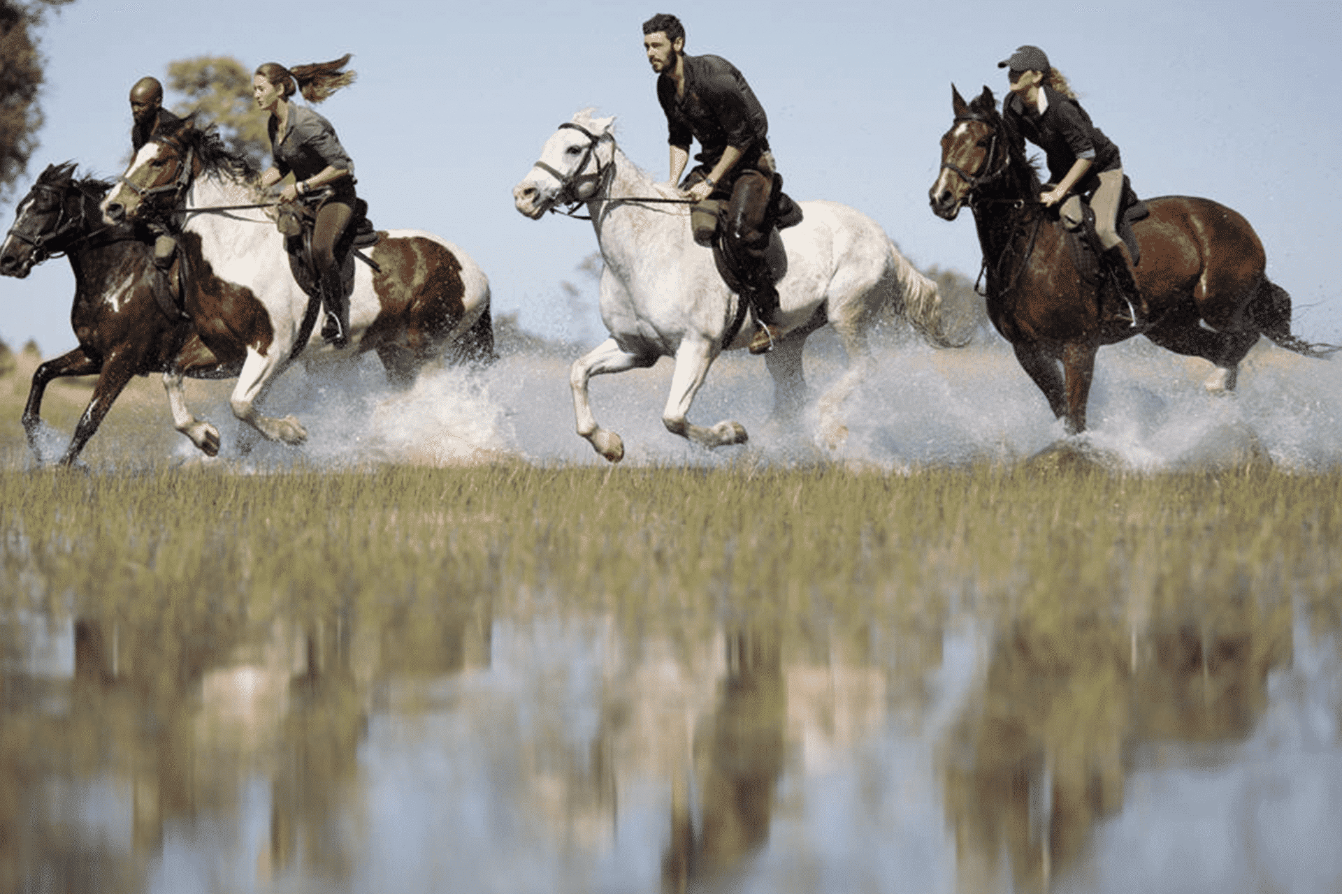 Guests on a horseback safari in the Okavango Delta in Botswana