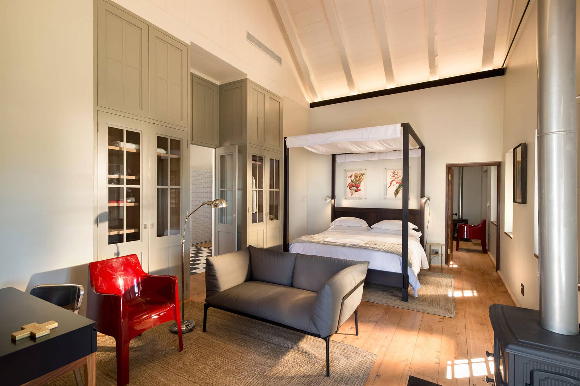 A bedroom interior in the Farmhouse at Babylonstoren Farm and Hotel