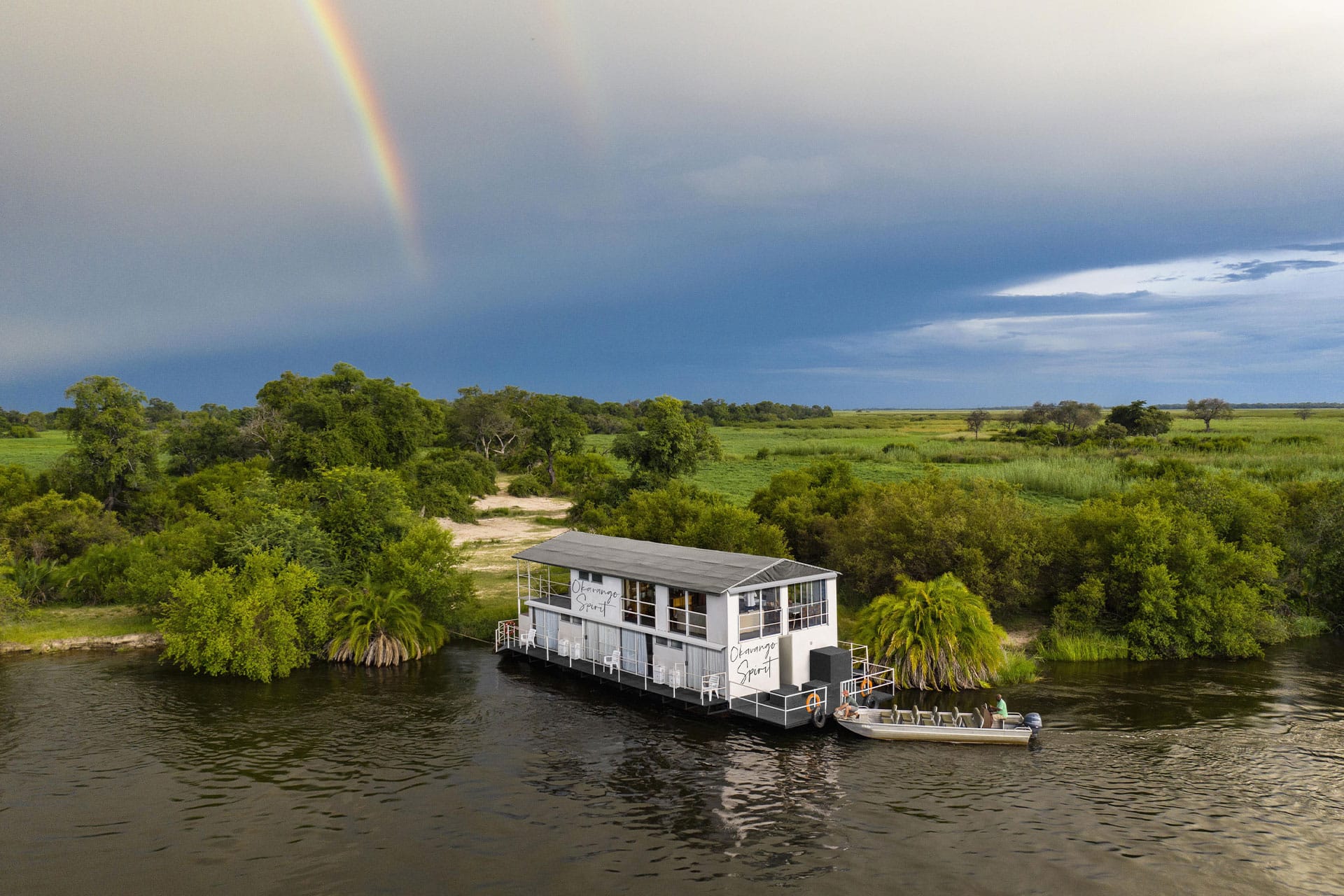 The Okavango Spirit houseboat on a river in Botswana.