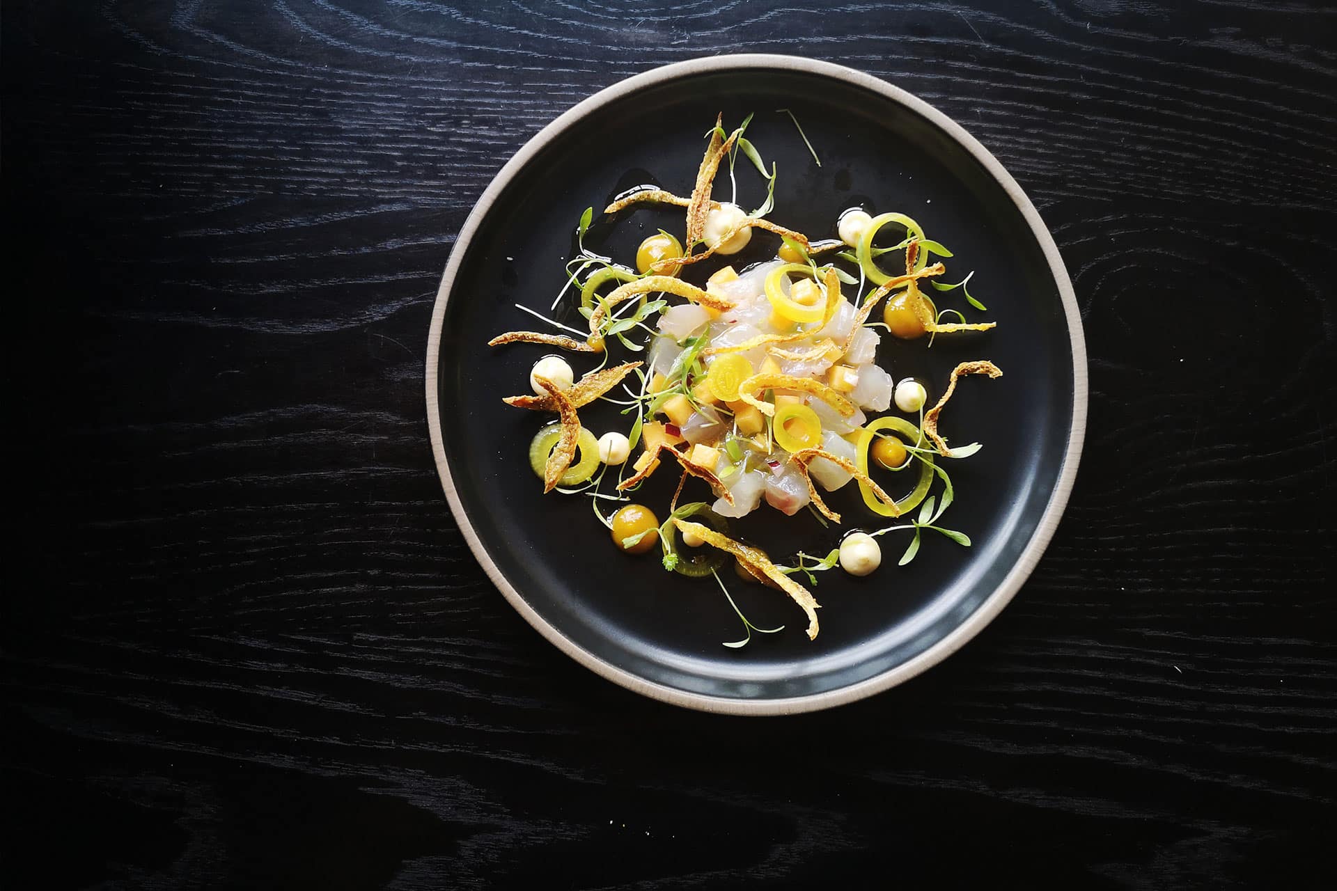 A plated dish at Belly of the Beast – one of the top 10 fine dining restaurants in Cape Town.