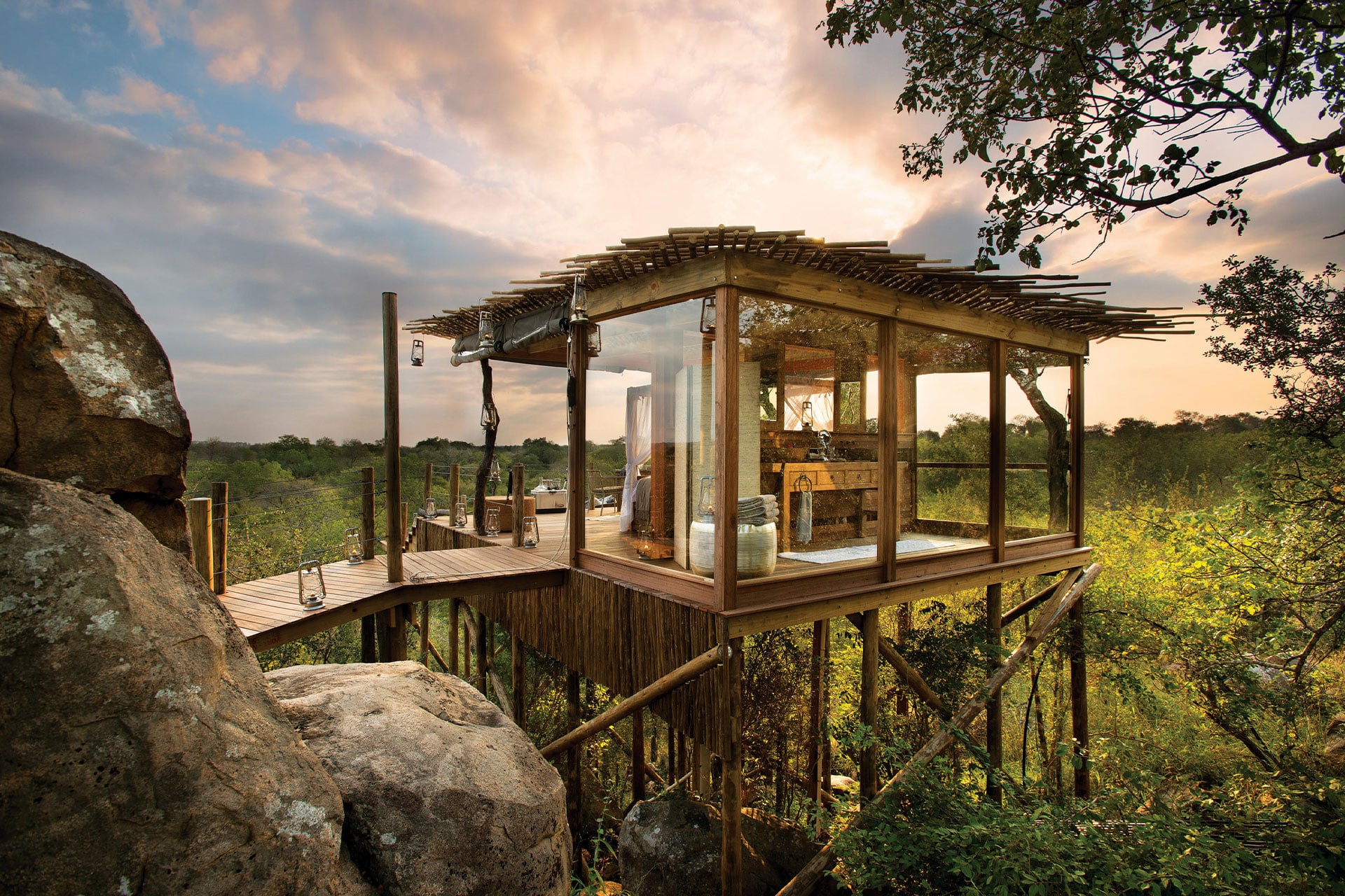 A luxury treehouse elevated above the bush in the Lion Sands Game Reserve.