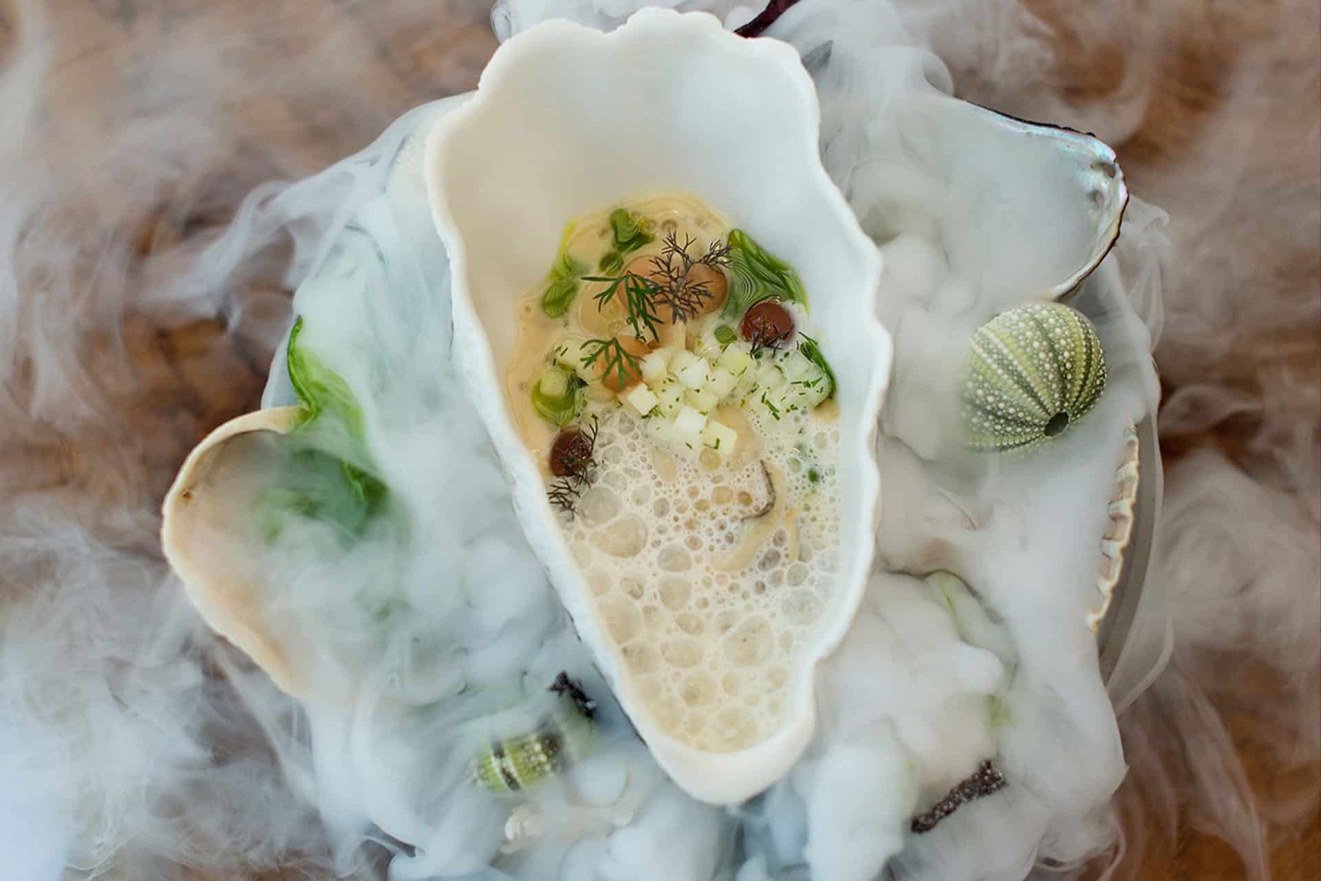 A contemporary plated seafood dish at PIER – one of the top 10 fine dining restaurants in Cape Town.