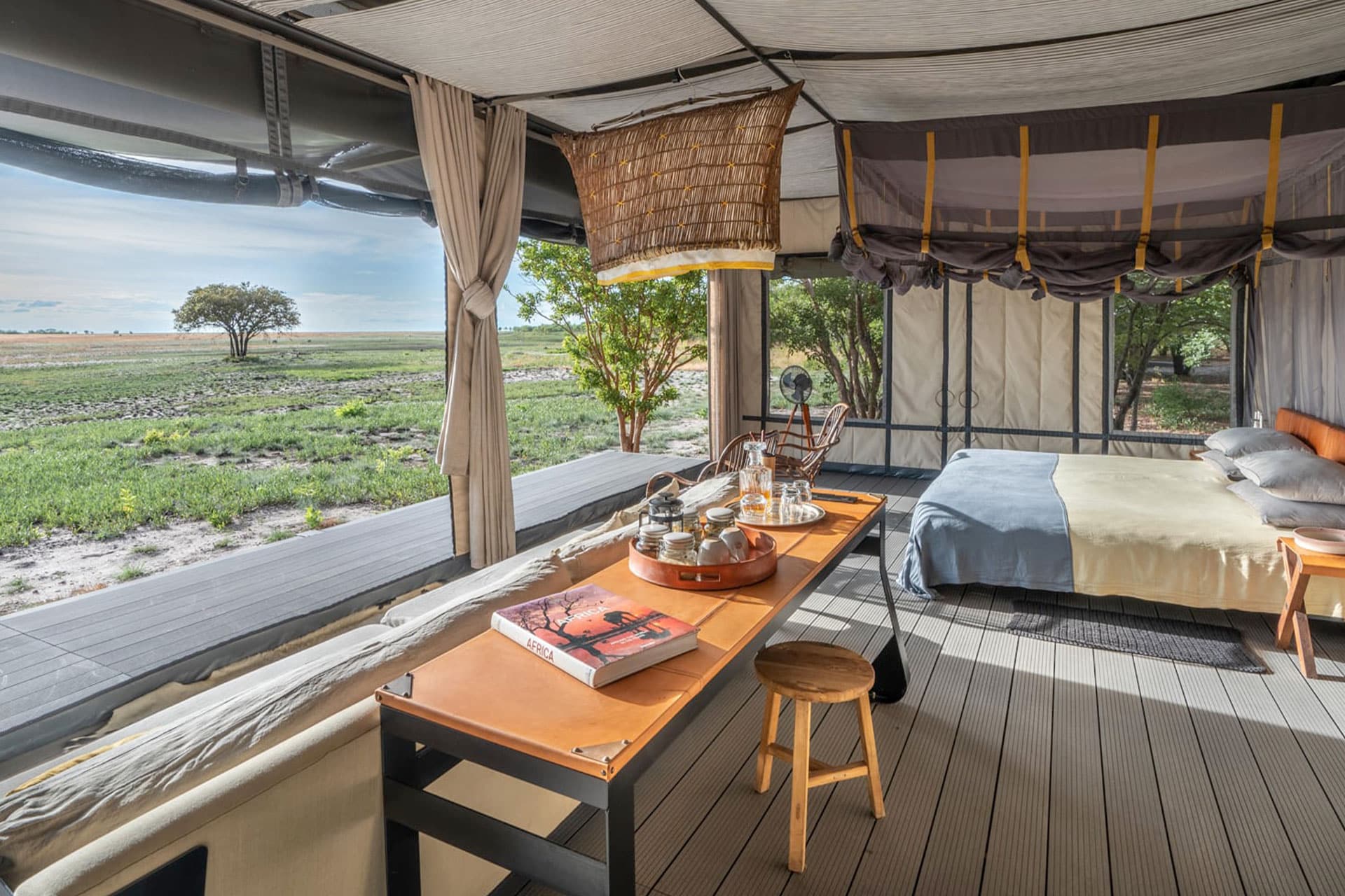 A luxury safari tent at King Lewanika with views of the wilderness.