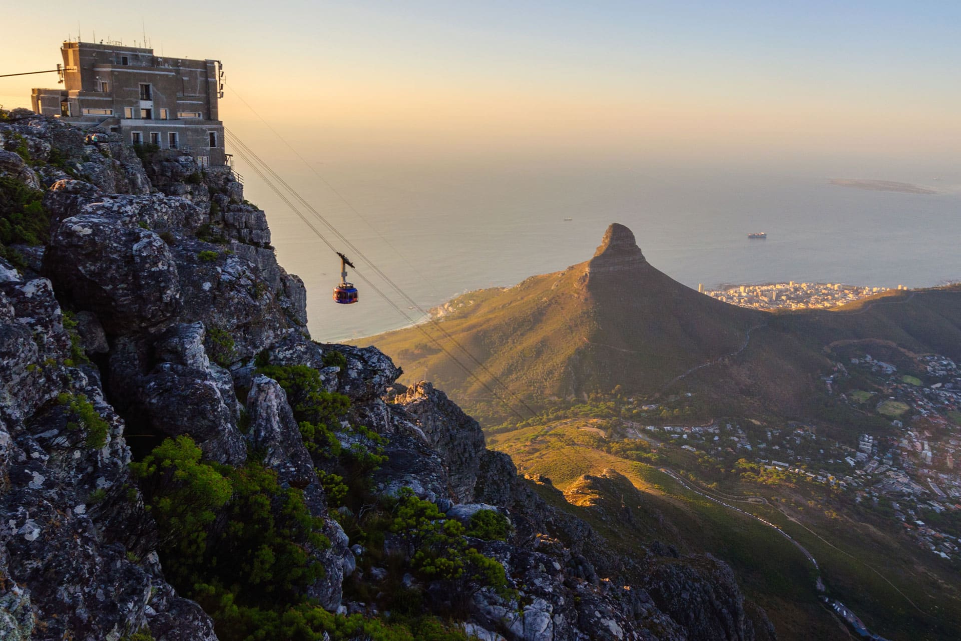 The Table Mountain Aerial Cableway with Lion’s Head in the background.