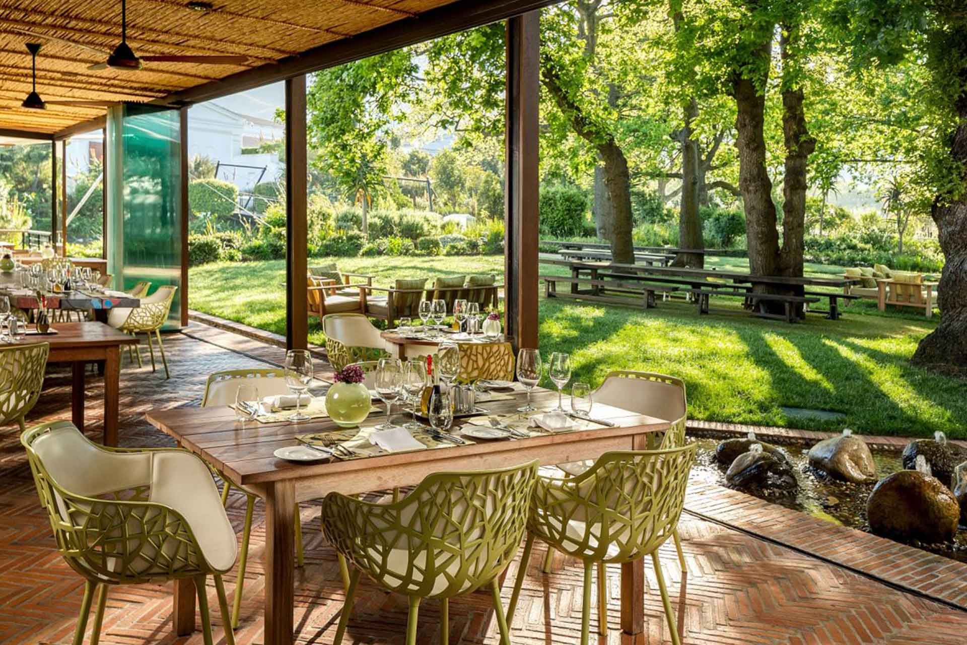 The terrace and gardens at Pierneef à La Motte restaurant – one of the top Cape Winelands restaurants.