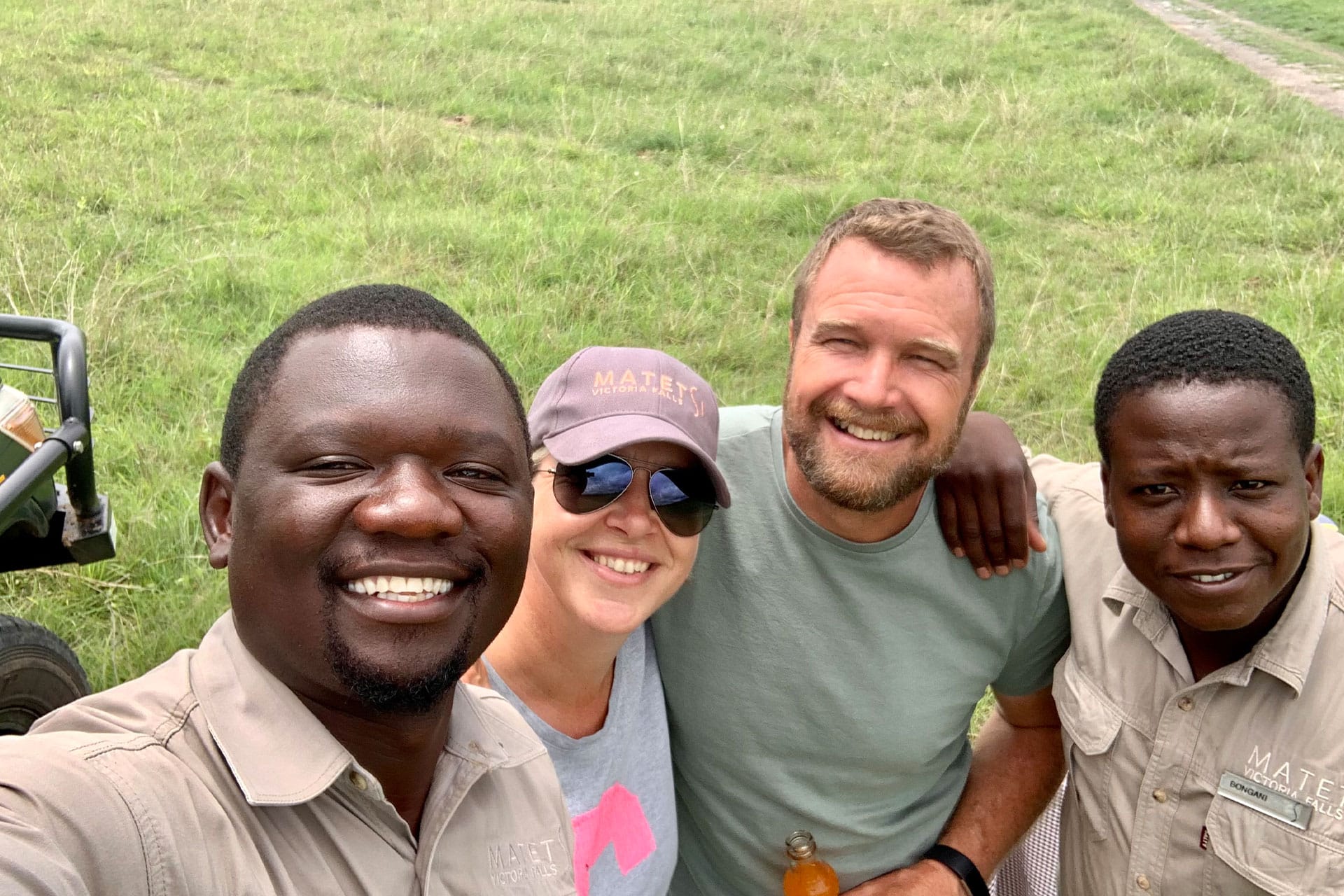 A selfie of Monika Iuel at Matetsi Victoria Falls with husband Chris, ranger Mike and tracker Bongi.