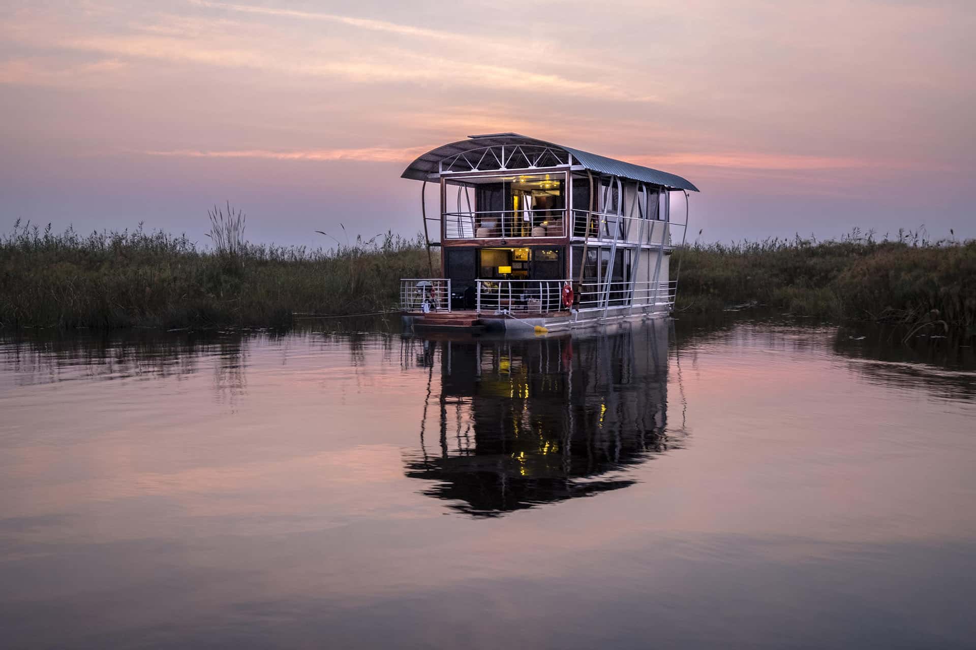 Unique luxury boat tour of the Namushasha River. Luxury interior boat villa.