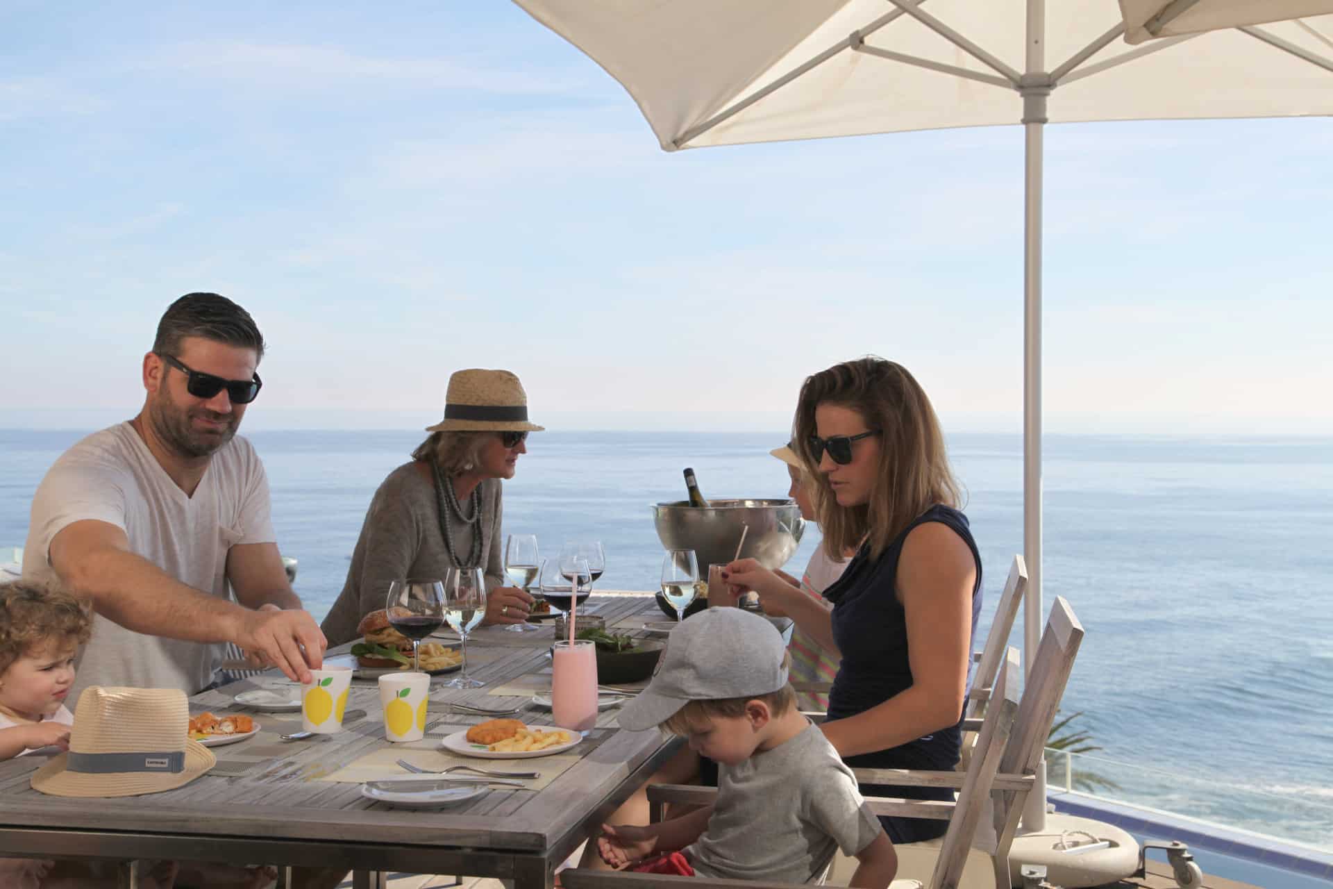 Family dining at one of the Ellerman House’s villas - an indulgent experience during Christmas in South Africa.