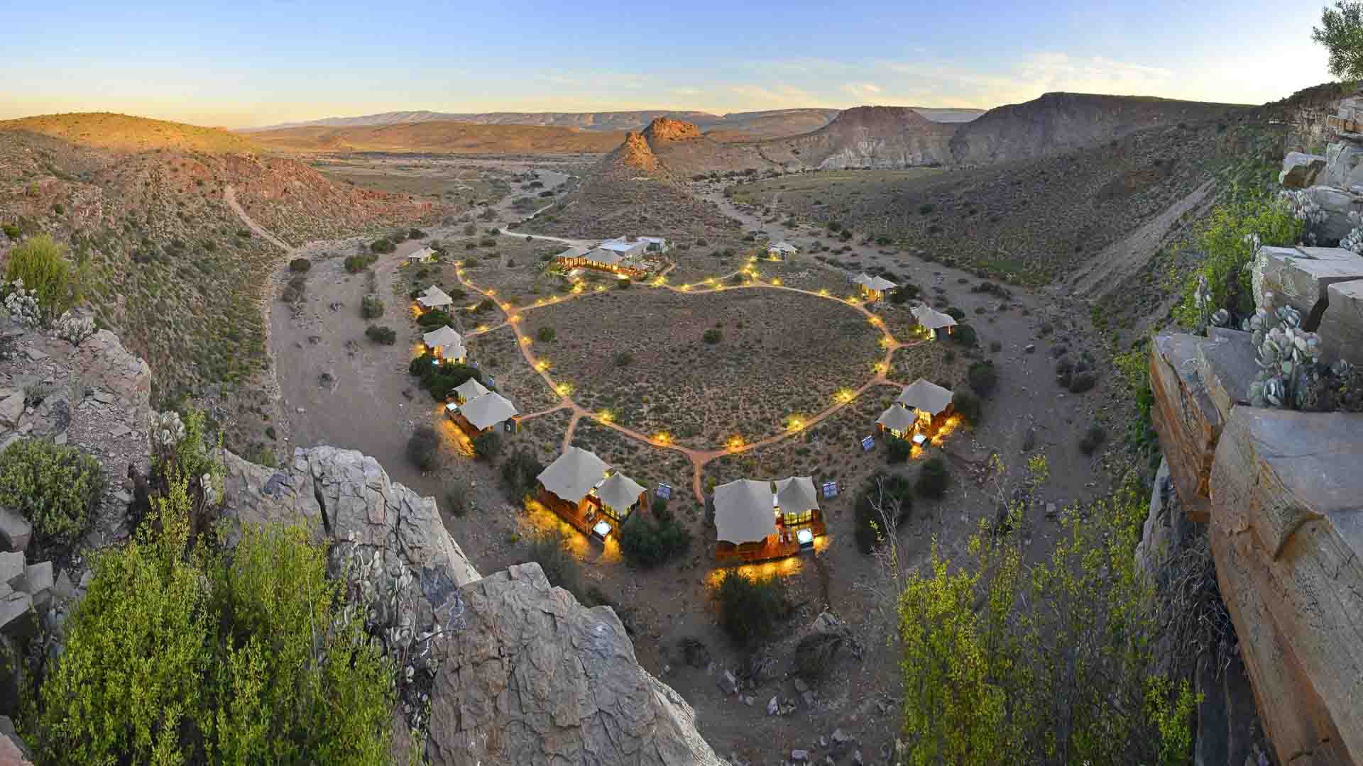 A birds-eye-view of the stunning Dwyka Tented Lodge at Sanbona Wildlife Reserve - stay here as part of your off the beaten track Southern Africa safari.