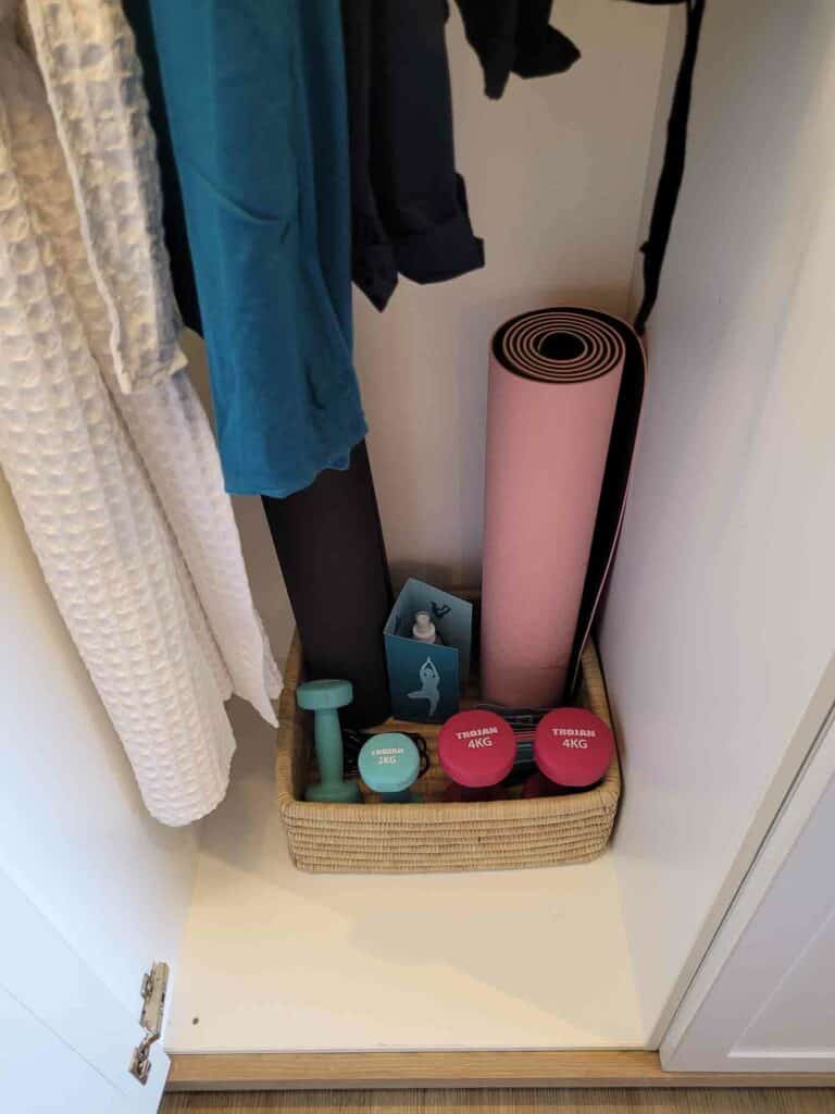 Yoga mats and fitness equipment in the cupboard at Sala Beach House – a popular Ballito hotel in South Africa.