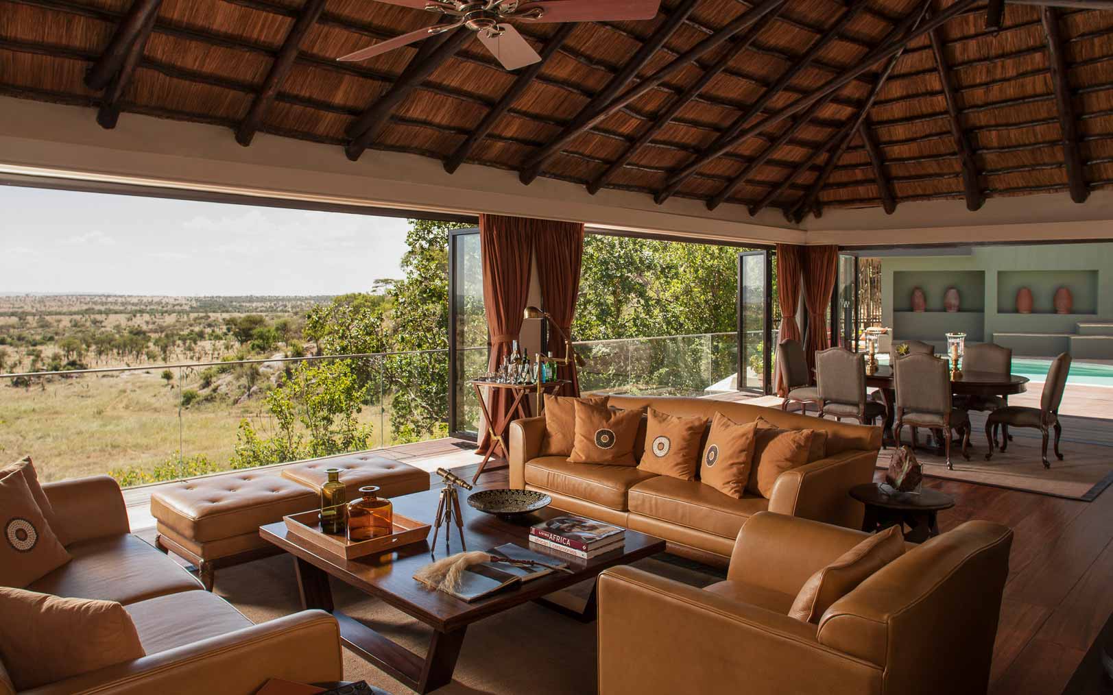 The spacious, open-plan lounge area at the Four Seasons Serengeti Presidential Villa - one of the top villas in Africa. 