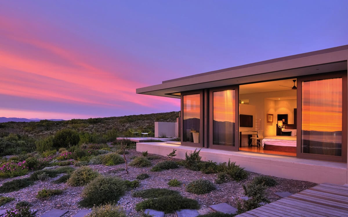 A magical sunset over the 6-bedroom villa at Grootbos Private Nature Reserve - one of the top villas in Africa.