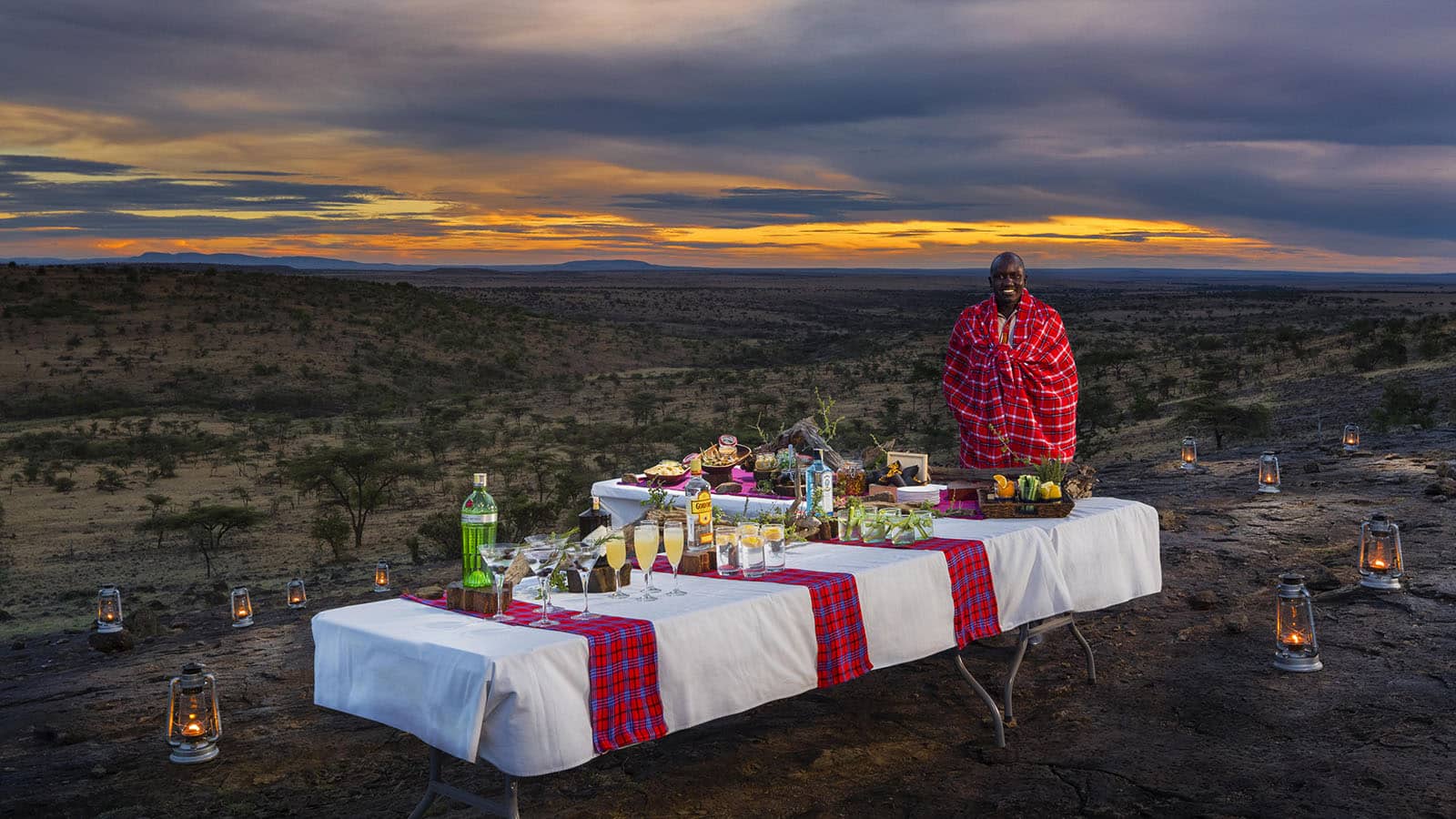 Safari sundowner table set up at Mahali Mizuri lodge with Ker & Downey Africa