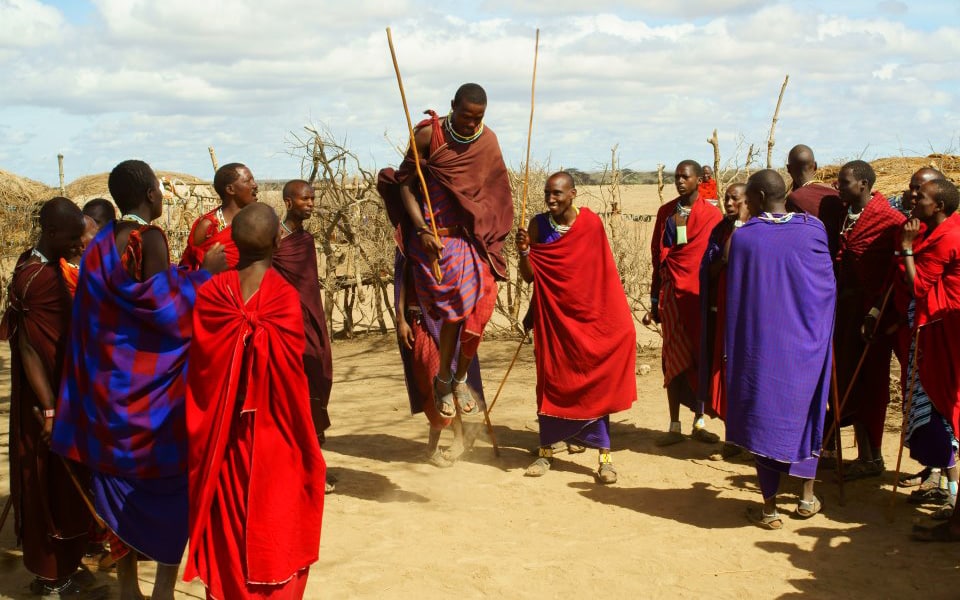 Maasai warriors jumping at Mto wa mbu town with with Ker & Downey® Africa