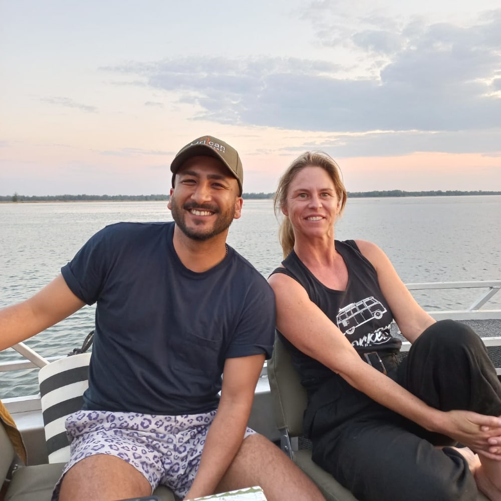 Sarah Morris with an African Bush Camps representative at Lolebezi on a Zambezi boat cruise