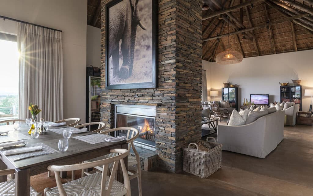 Sarili with fireplace, dining room and lounge with Ker & Downey Africa