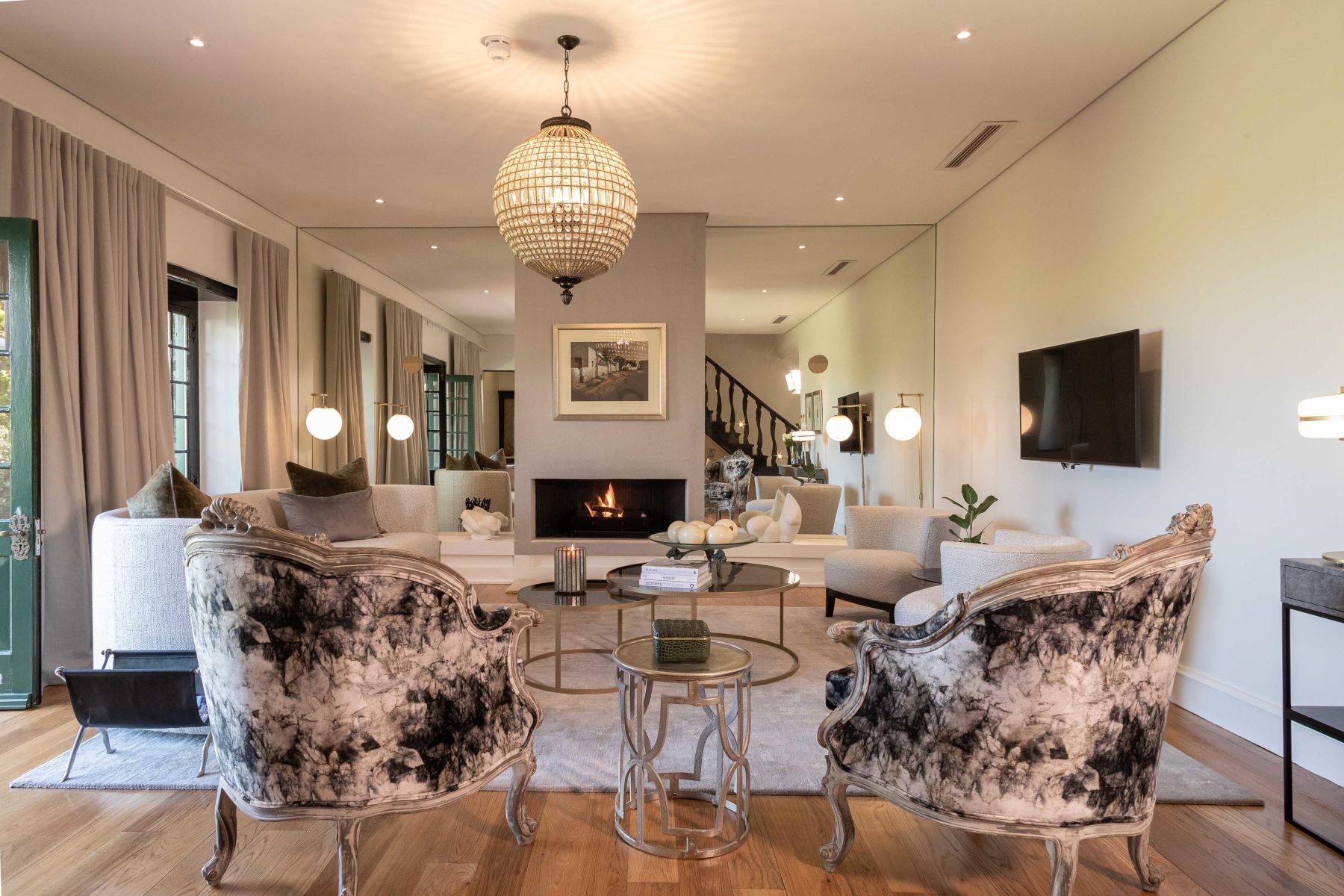 Spacious lounge in the one-bedroom suite at Steenberg Hotel & Spa with Ker & Downey Africa