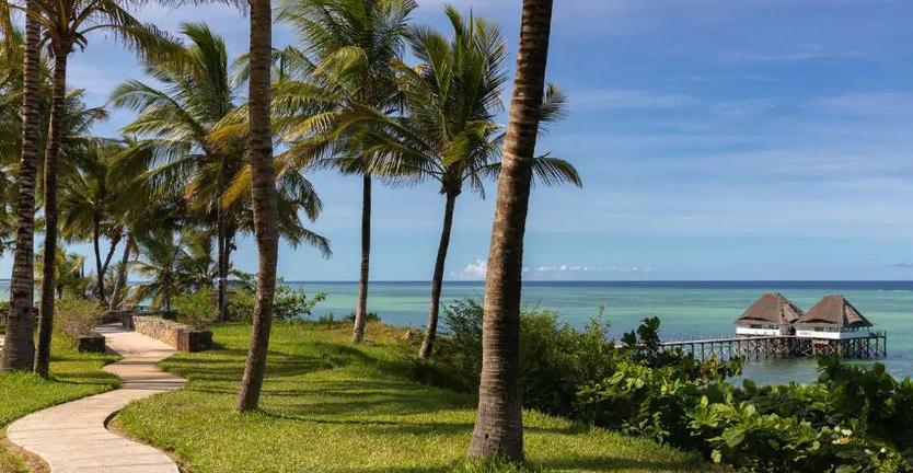 Pathway overlooking the beach at Melia Zanzibar with Ker & Downey Africa