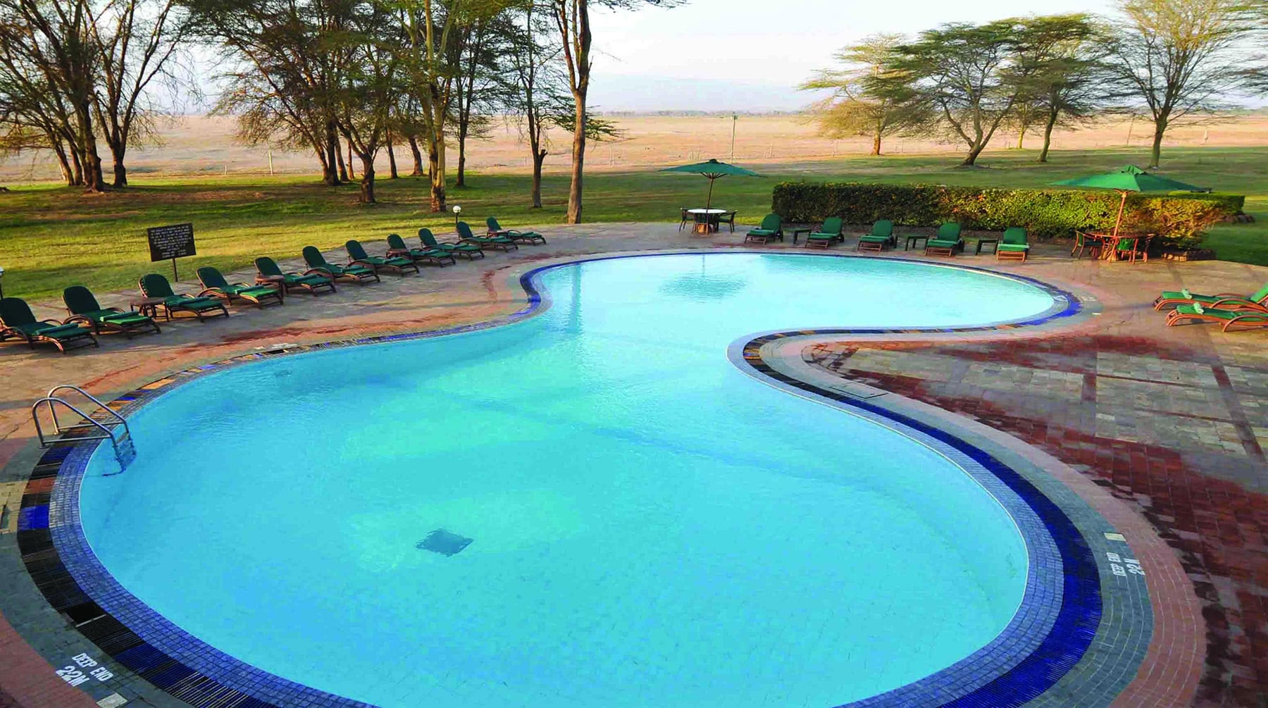 The large swimming pool at Ol Tukai Lodge, with Ker & Downey Africa