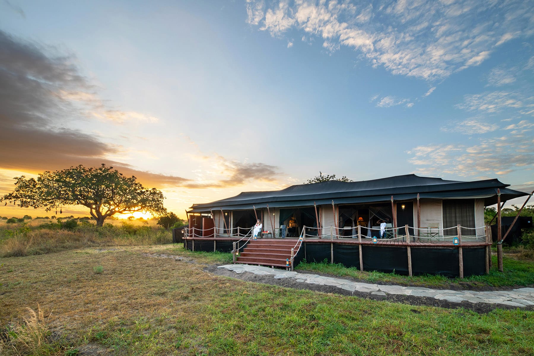 The exterior of a family tent at Elewana Sand River Mara, with Ker & Downey Africa