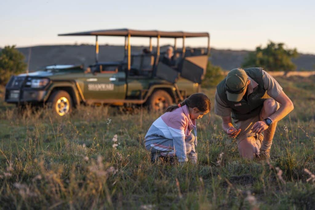 kid with guide jeep safari school spring break