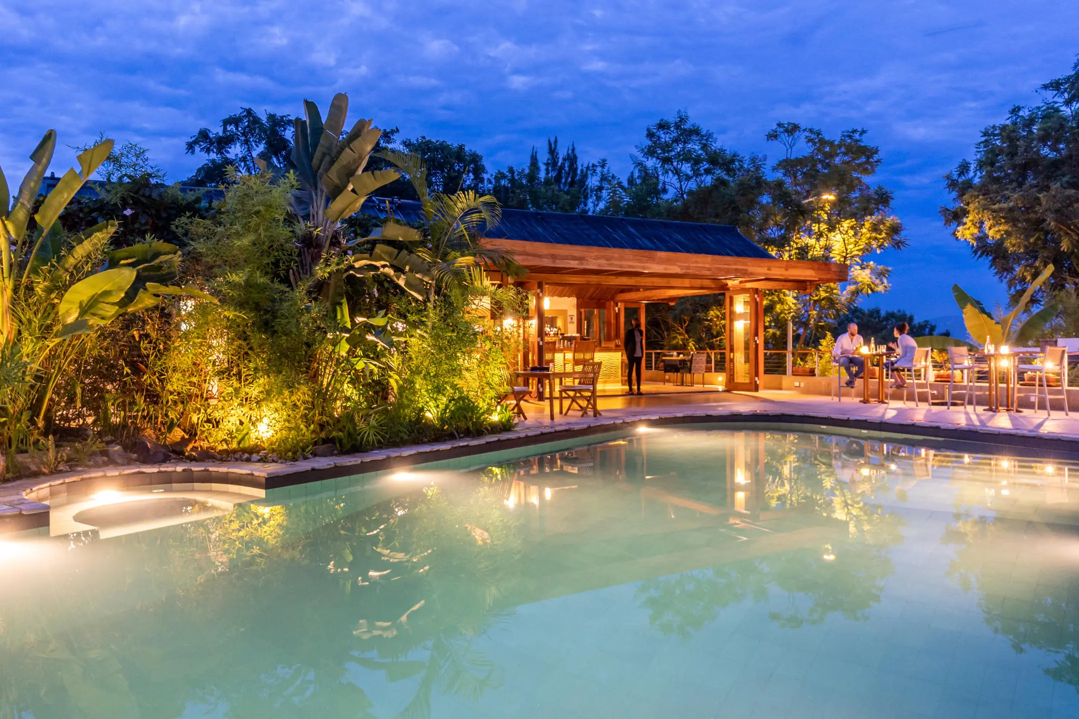 The Retreat Main Salt water pool lighting at night