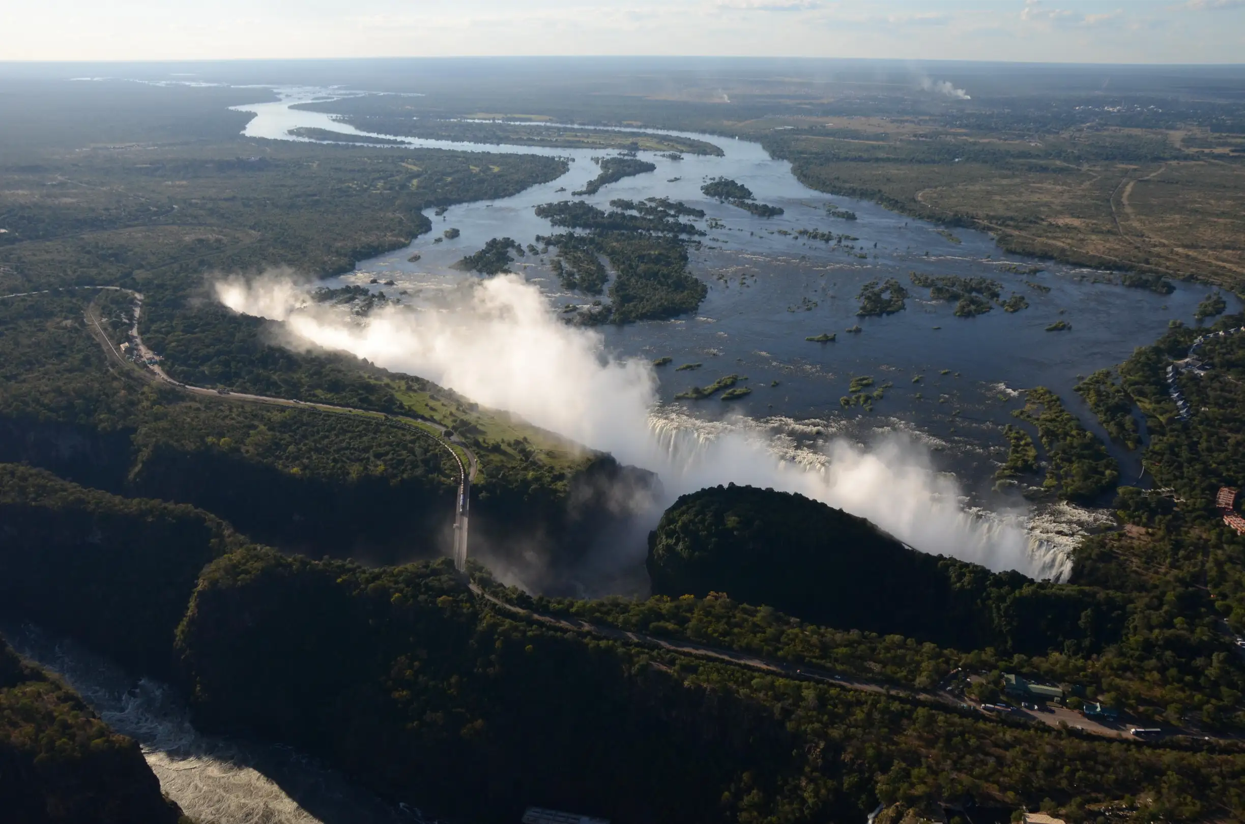 Aerial view of Victoria Falls and the Zambezi River, one of Africa’s top emerging travel destinations for scenic adventure during family safaris in Zambia