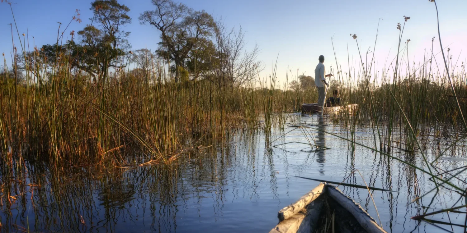 Traditional mokoro canoe safari in coastal wetlands combined with Luxury safaris by sea Africa experience